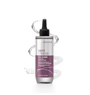 Joico Defy Damage In a Flash Bond Builder in a clear bottle with a black dropper cap, set against a white background with stylized water splash graphics.