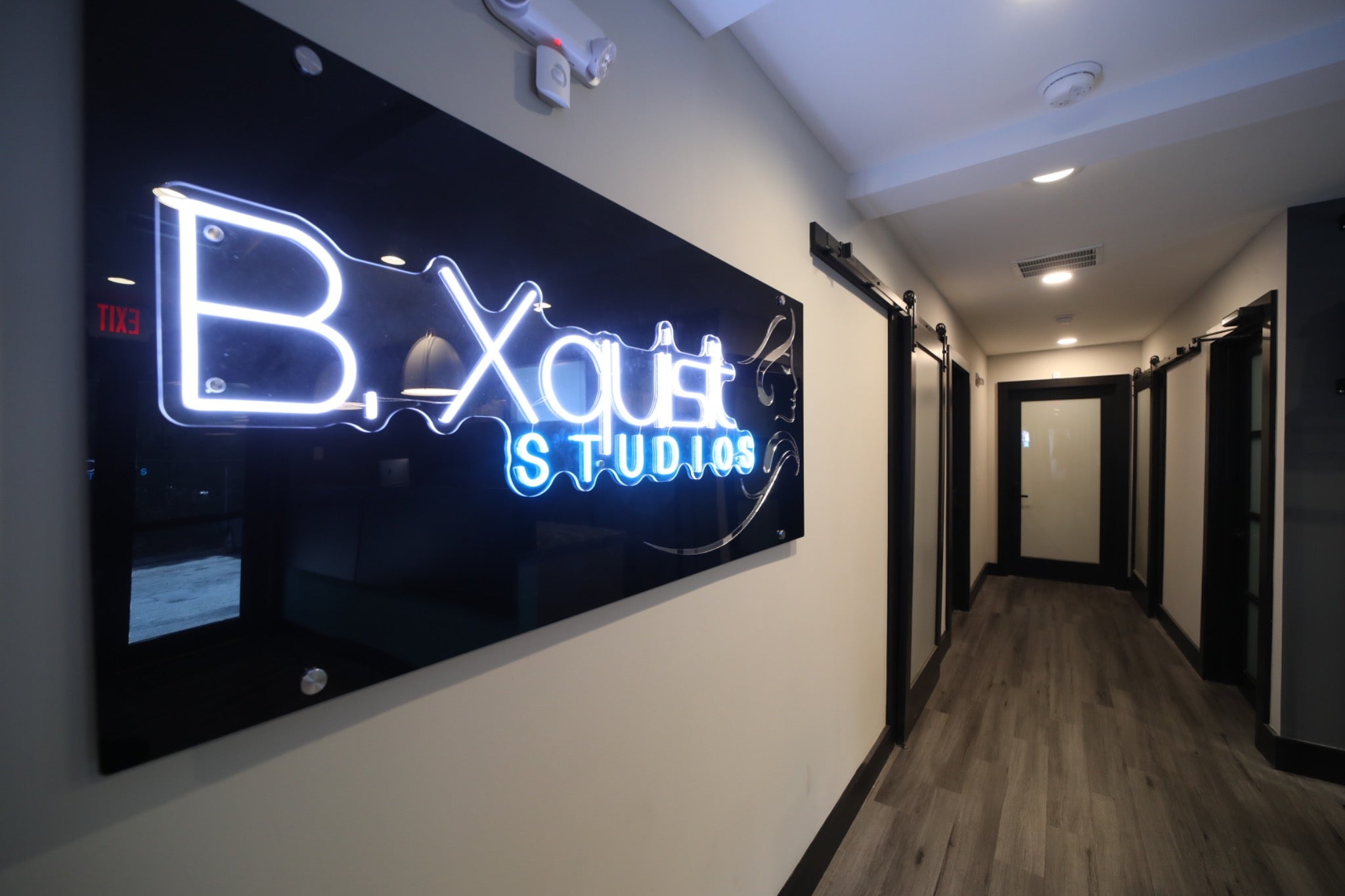 Illuminated B. Xquisit Studios salon sign
